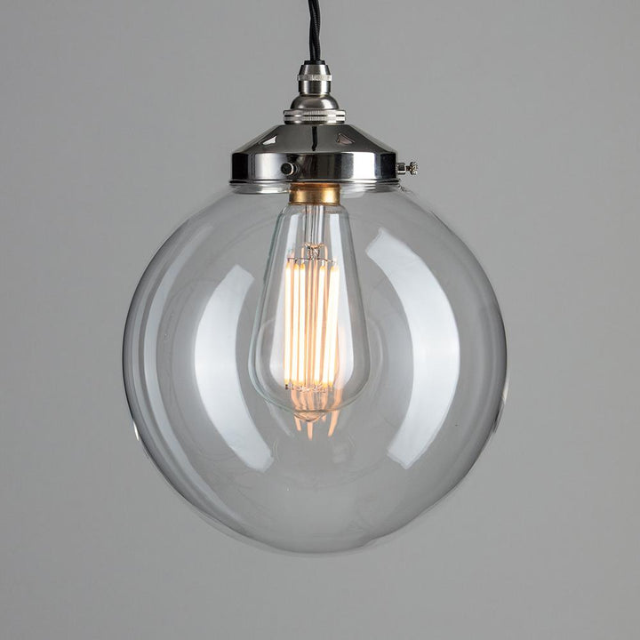 An elegant Globe Blown Glass Pendant Light (B22) with a chrome finish, perfect as a stylish addition to any space.