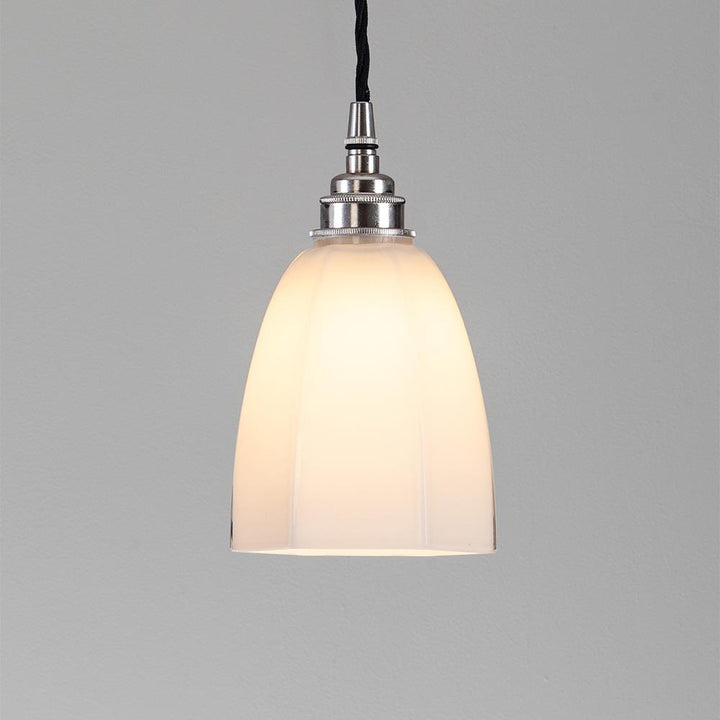 An Old School Electric Hexagon Pendant Light fixture with a white glass shade.
