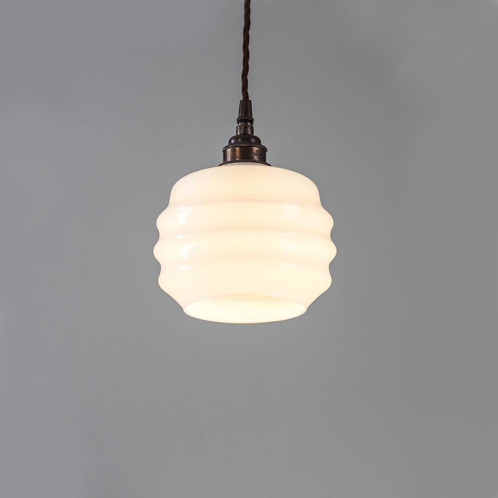 An Old School Electric Deco Opal Glass Pendant, a light fixture suspended from a ceiling, providing illumination in a space.