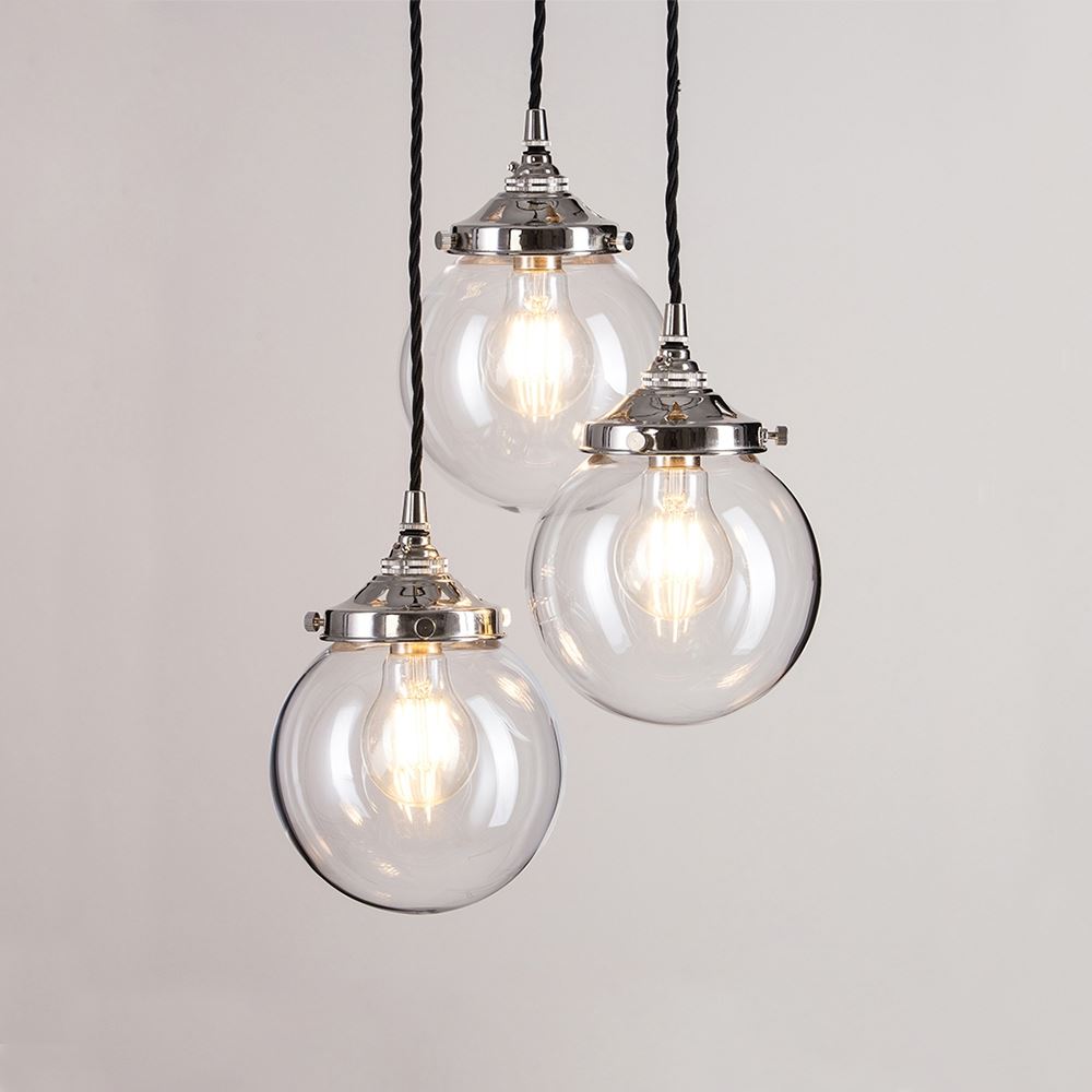 Three Old School Electric Blown Clear Glass Cluster Pendant Lights hanging from a chain, creating a stunning light fixture.