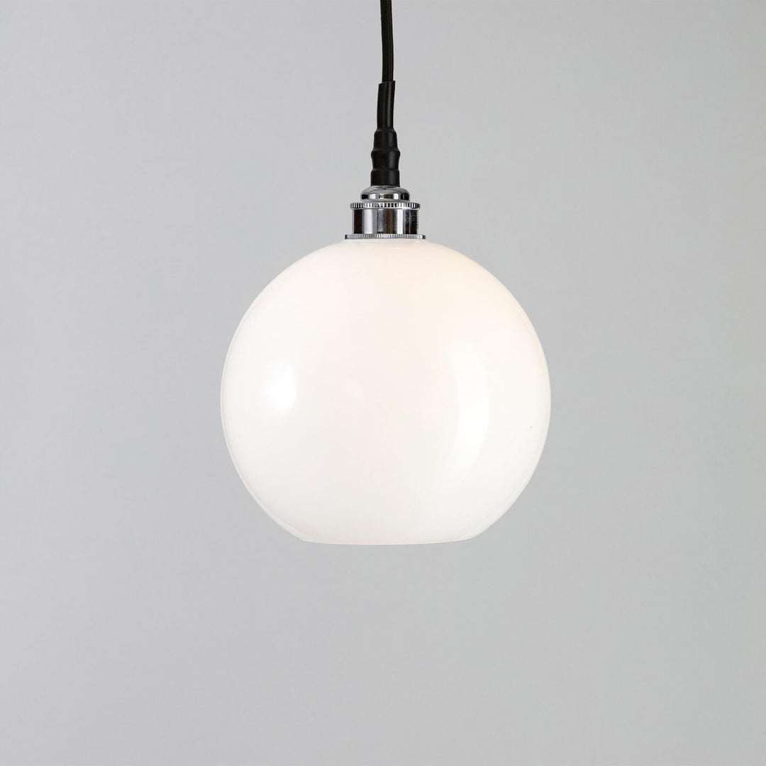 An Adderley Bathroom Pendant Light fitting hanging from an Old School Electric black cord.