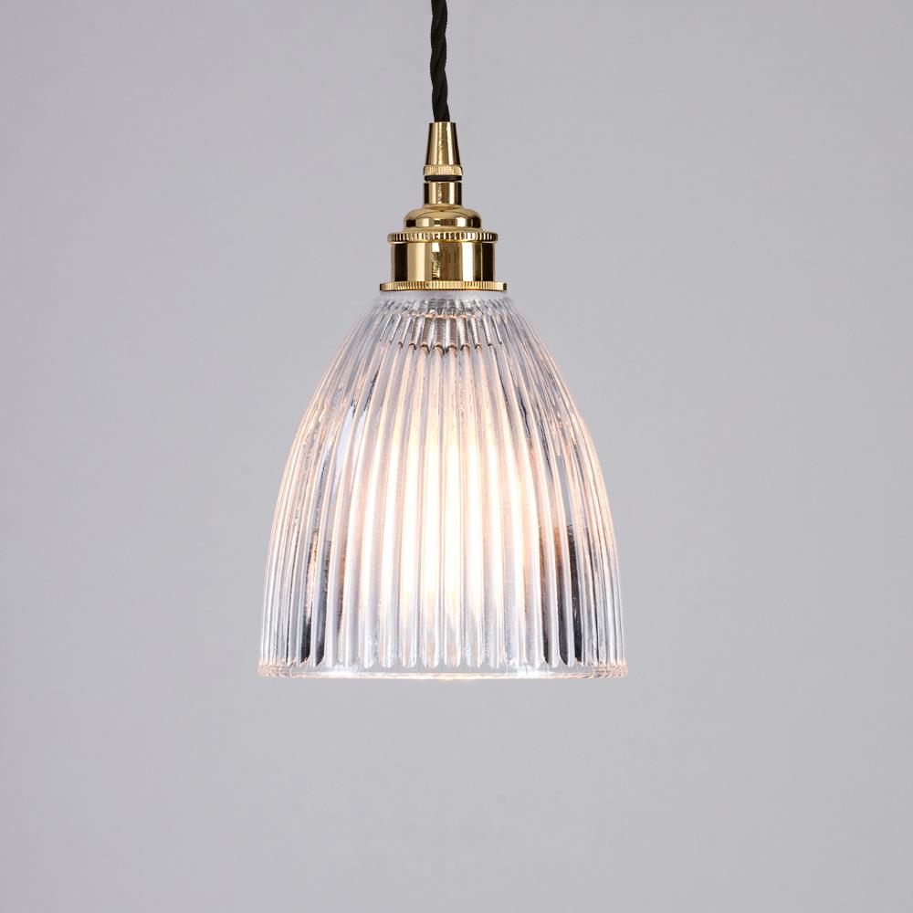 An Elongated Prismatic Pendant Light with an electric light fitting and a gold metal base by Old School Electric.