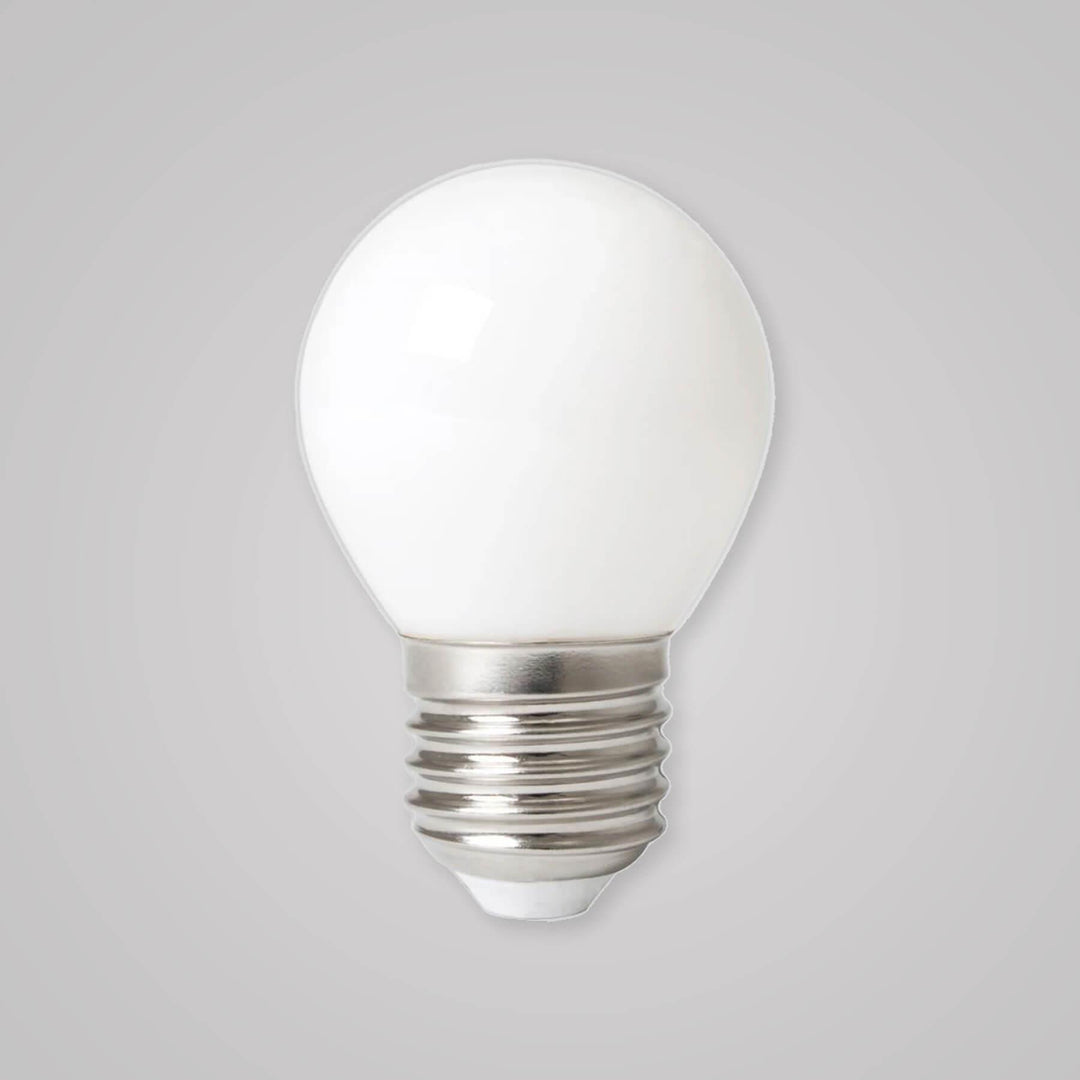 An Old School Electric LED Opal Dimmable Golf Ball Bulb (E27) on a gray background.