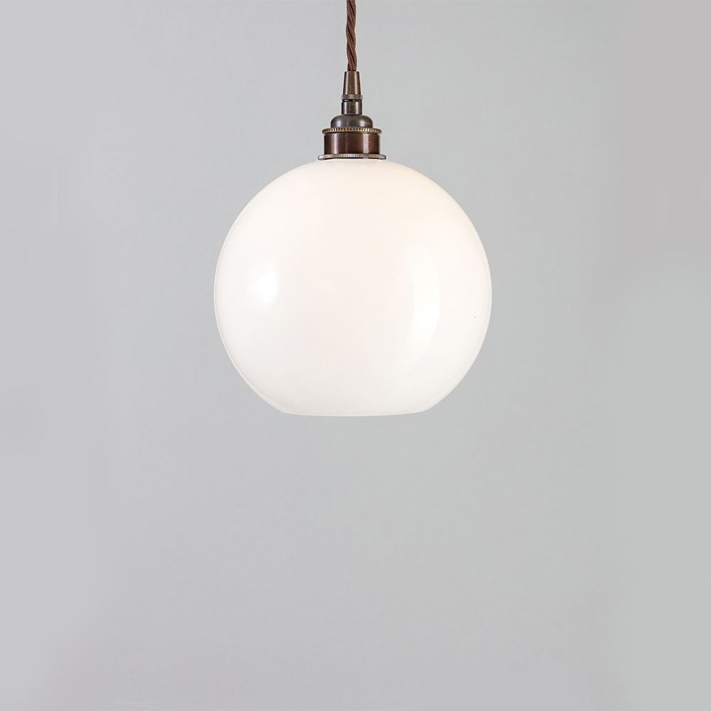 An Adderley pendant light with a white glass globe, perfect for lighting fixtures or as a stylish Old School Electric light fitting.