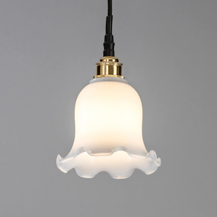 An Old School Electric Tulip Opal Glass Bathroom Pendant Light with a gold finish. This electric light fitting is an exquisite addition to any space.