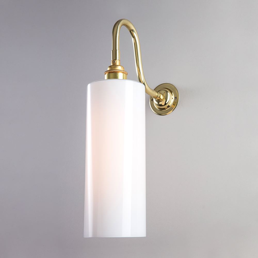 A Parker Wall Light by Old School Electric, with a white glass shade, perfect for lighting fixtures.