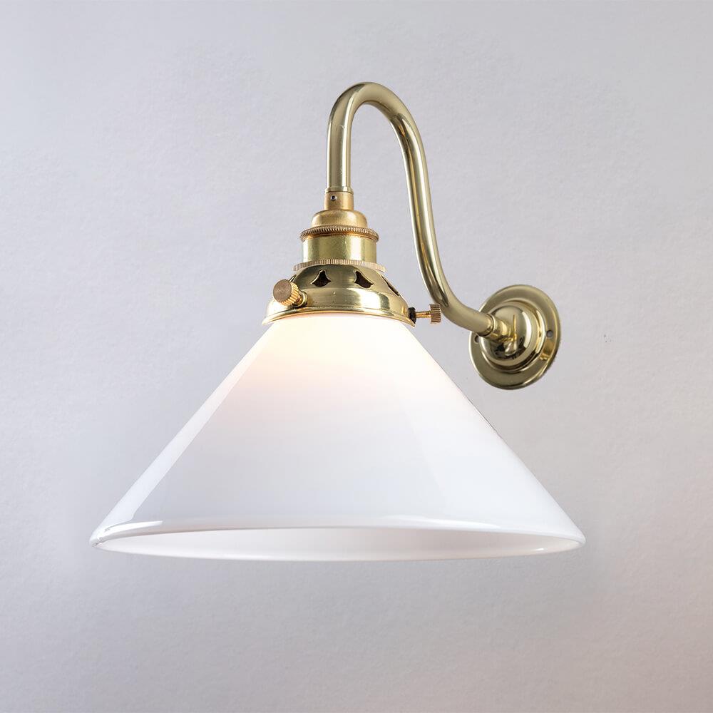 An Old School Electric Conical Glass Wall Light with a white shade, perfect for adding ambiance to any room with its elegant and modern lighting fixture design.