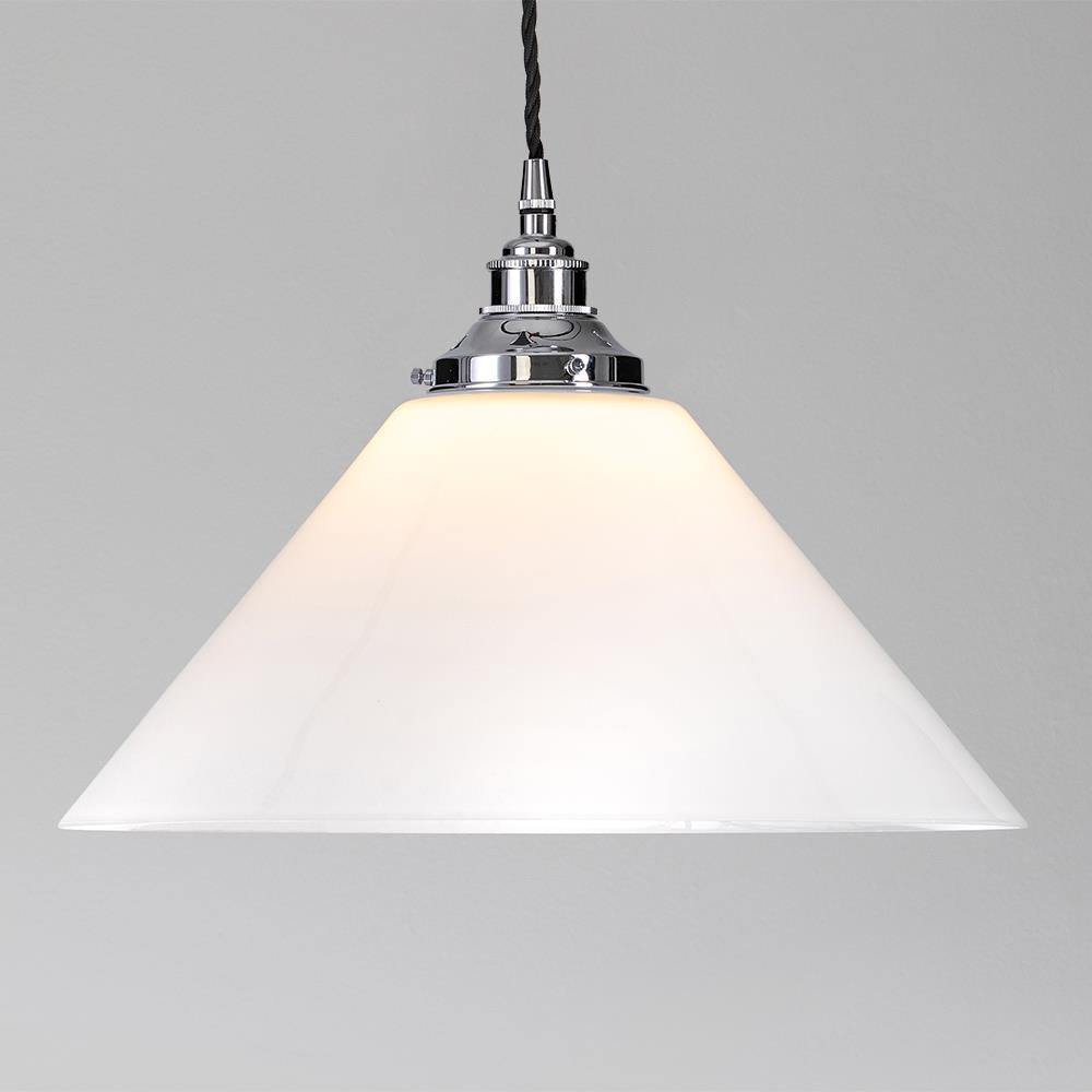 A Conical Opal Glass Pendant Light with a white glass shade by Old School Electric.