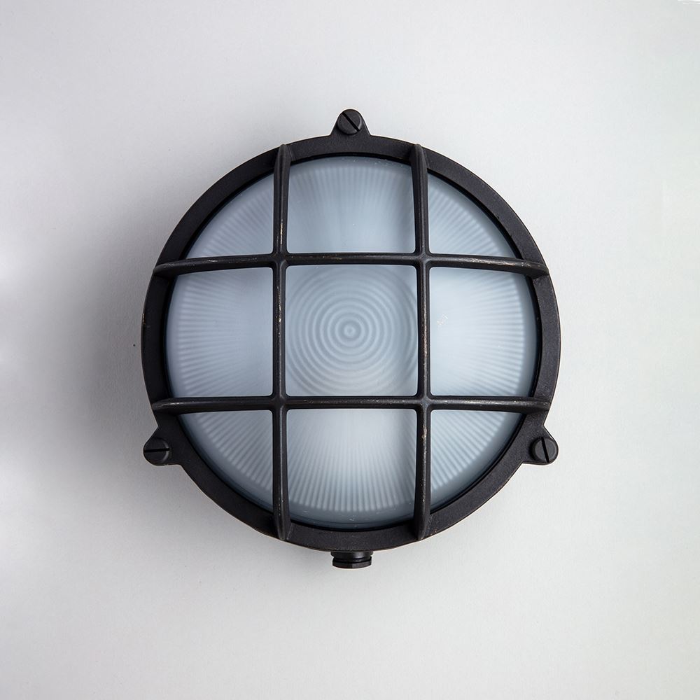 An Old School Electric Round Bulkhead Light with a white background.