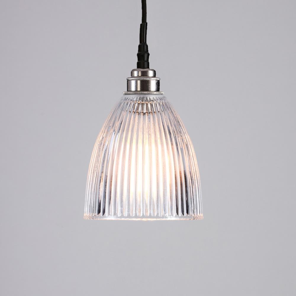 A elongated prismatic bathroom pendant light from Old School Electric, with a black cord, perfect for lighting fixtures and adding a stylish light fitting to any space.