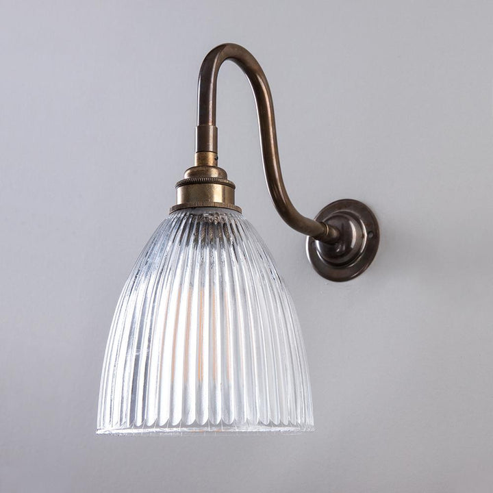 An Old School Electric Elongated Swan Arm Prismatic Wall Light.