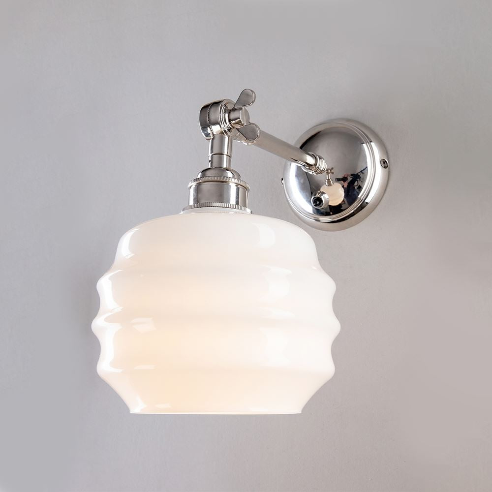 An Old School Electric Deco Opal Adjustable Arm Wall Light with a white glass shade, perfect for lighting fixtures.