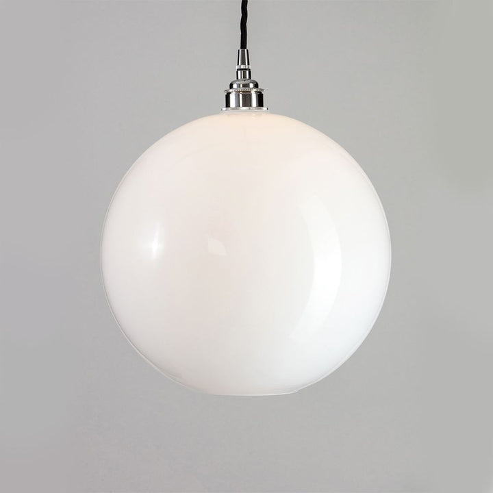 An Adderley Pendant Light by Old School Electric, on a grey background.
