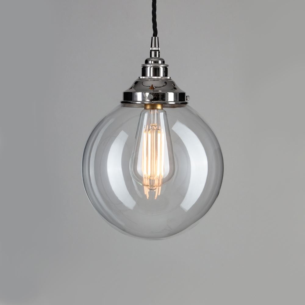 An Old School Electric Globe Blown Glass Pendant Light fixture with a metal chain.