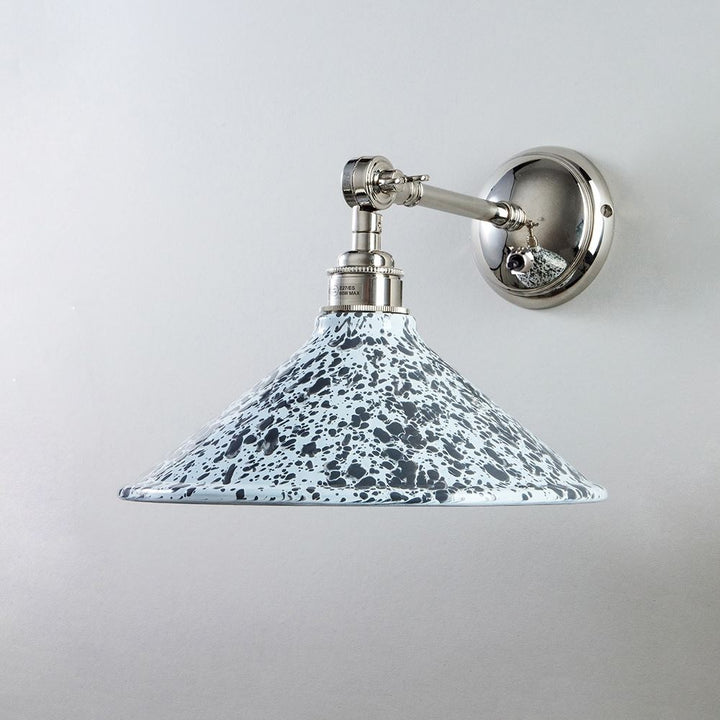 An Old School Electric Splatter Wear Shade Adjustable Arm Wall Light with a blue speckled shade.