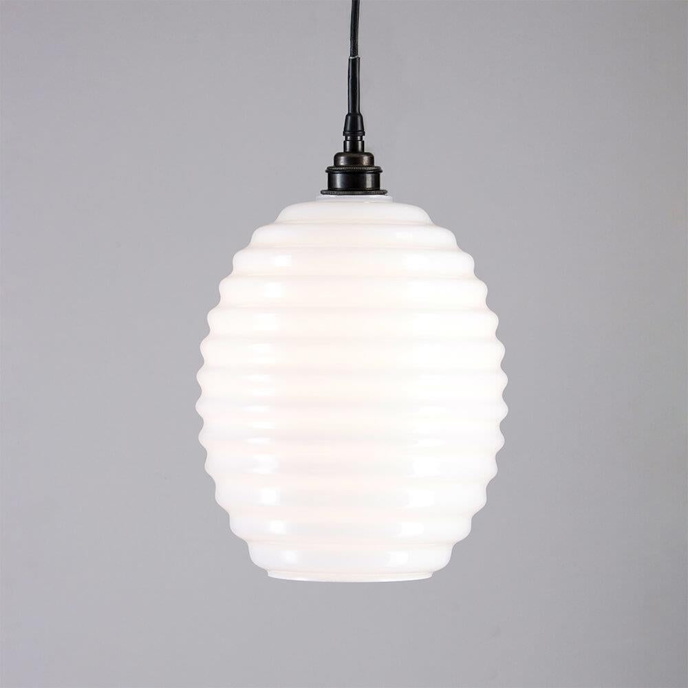 An Old School Electric Beehive Bathroom Pendant Light with a white glass shade, perfect for lighting fixtures.