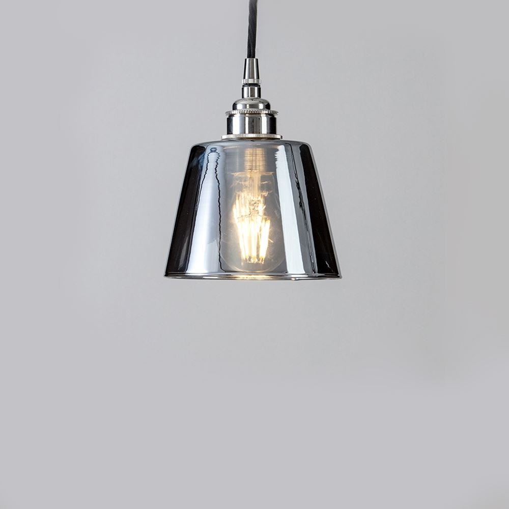An Old School Electric Tapered Blown Smoked Glass Pendant Light with a glass shade and a metal base, serving as a lighting fixture and light fitting.