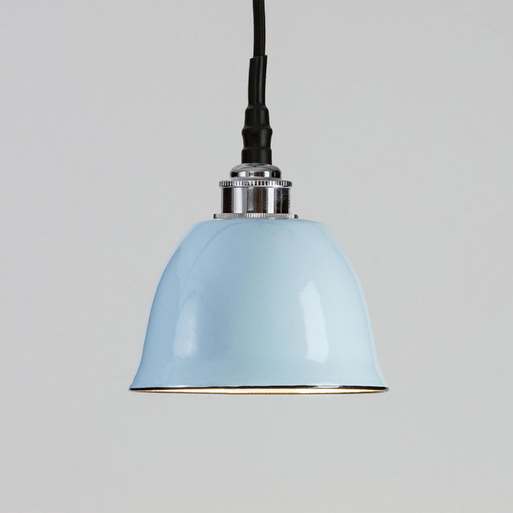 An Old School Electric Maison Bathroom Pendant Light with a blue shade and a black cord.