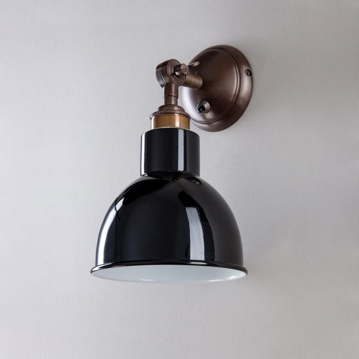 An Old School Electric Churchill Short Arm Wall Light with a black shade. Suitable for both indoor and outdoor lighting fixtures.