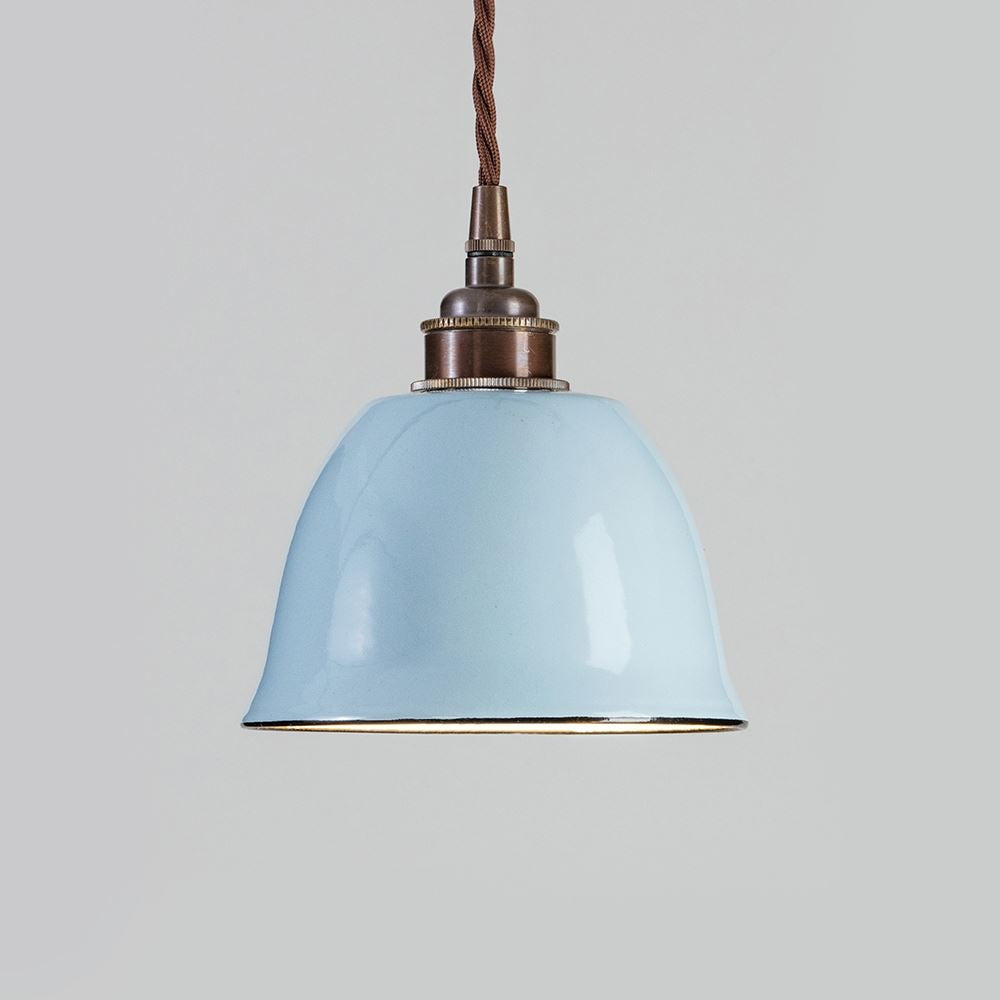An Old School Electric Maison Pendant Light with a blue shade and a brown cord.
