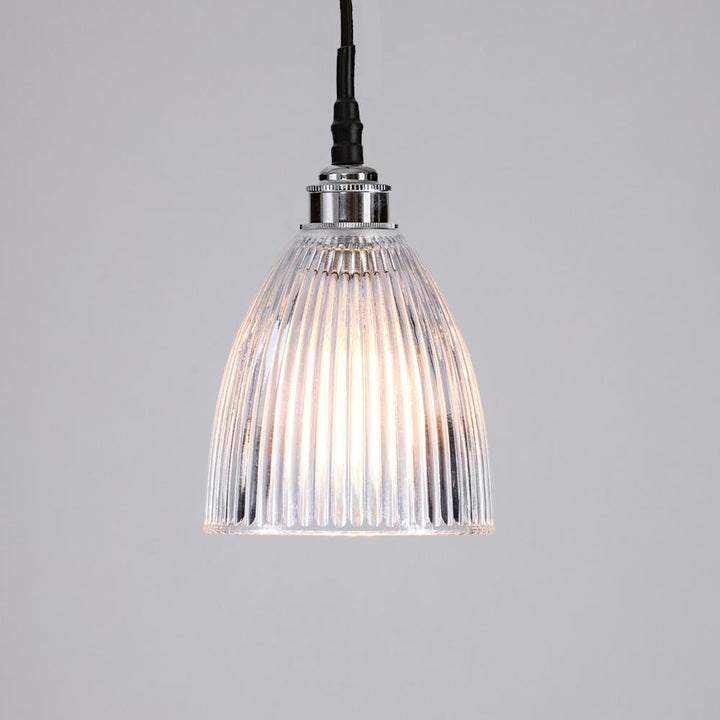 An elegant Elongated Prismatic Bathroom Pendant Light from Old School Electric with a sleek black cord.