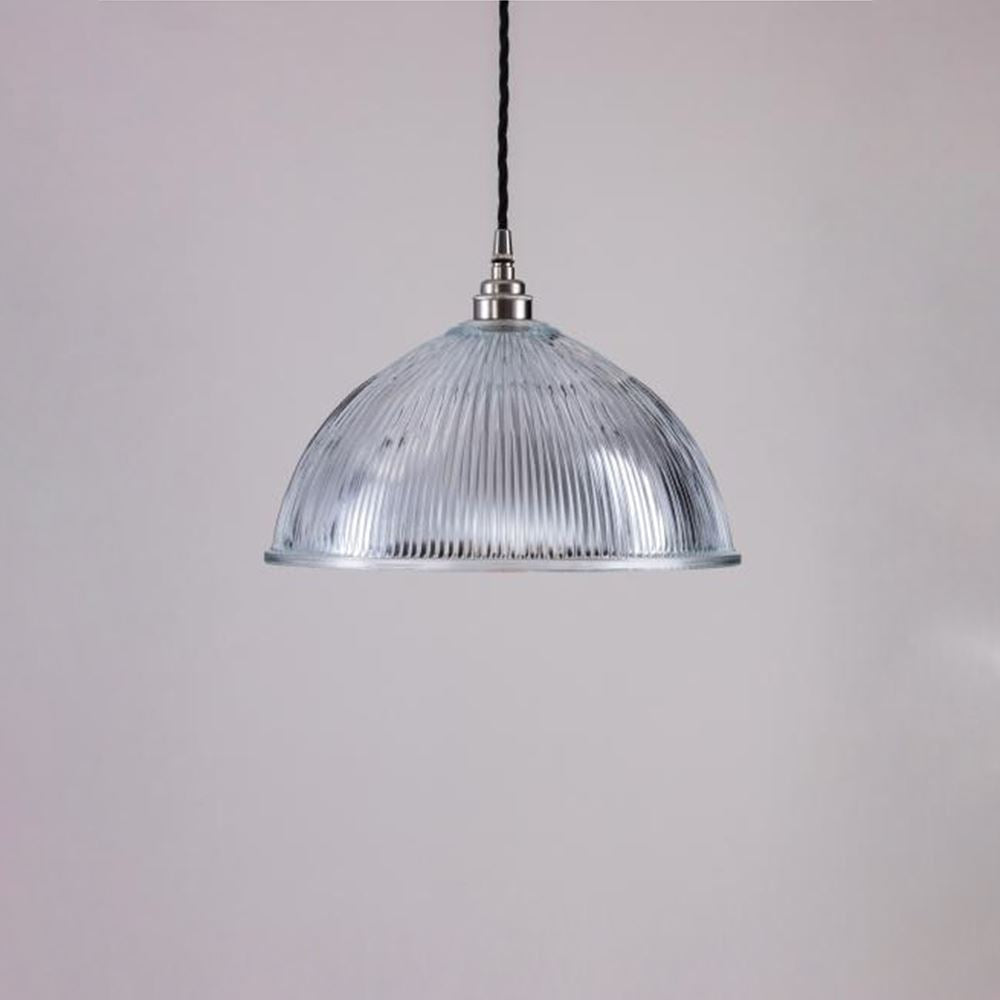 An Old School Electric Prismatic Dome Pendant Light suspended from a black cord.