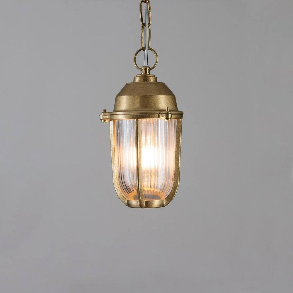 This Old School Electric Boatyard Pendant Light exudes maritime charm with its nautical inspiration and features a clear glass shade.