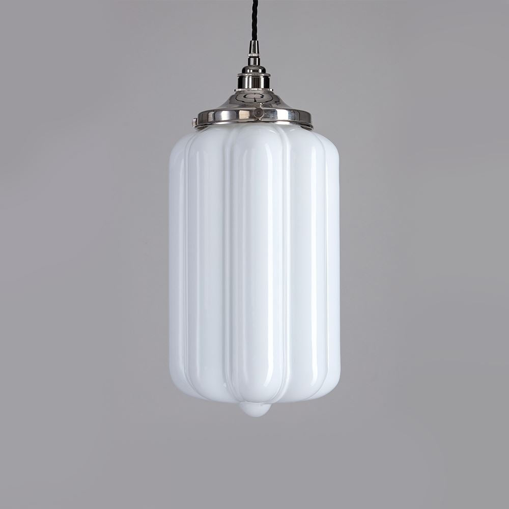 An Ellington Opal Glass Pendant Light by Old School Electric hanging on a gray background creates a stunning illumination display.