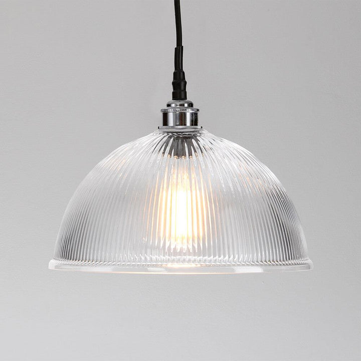 An Old School Electric Prismatic Dome Bathroom Pendant Light on a white background.