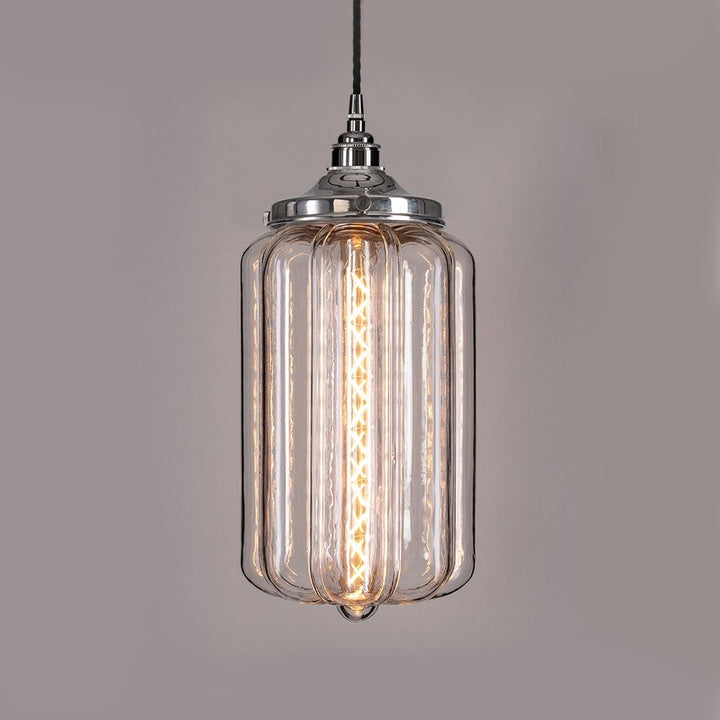 An Ellington Pendant Light by Old School Electric is a modern chrome-finished glass pendant light fitting.