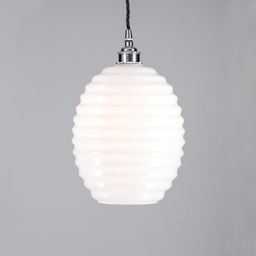 An Old School Electric Beehive Pendant Light with a white glass shade.