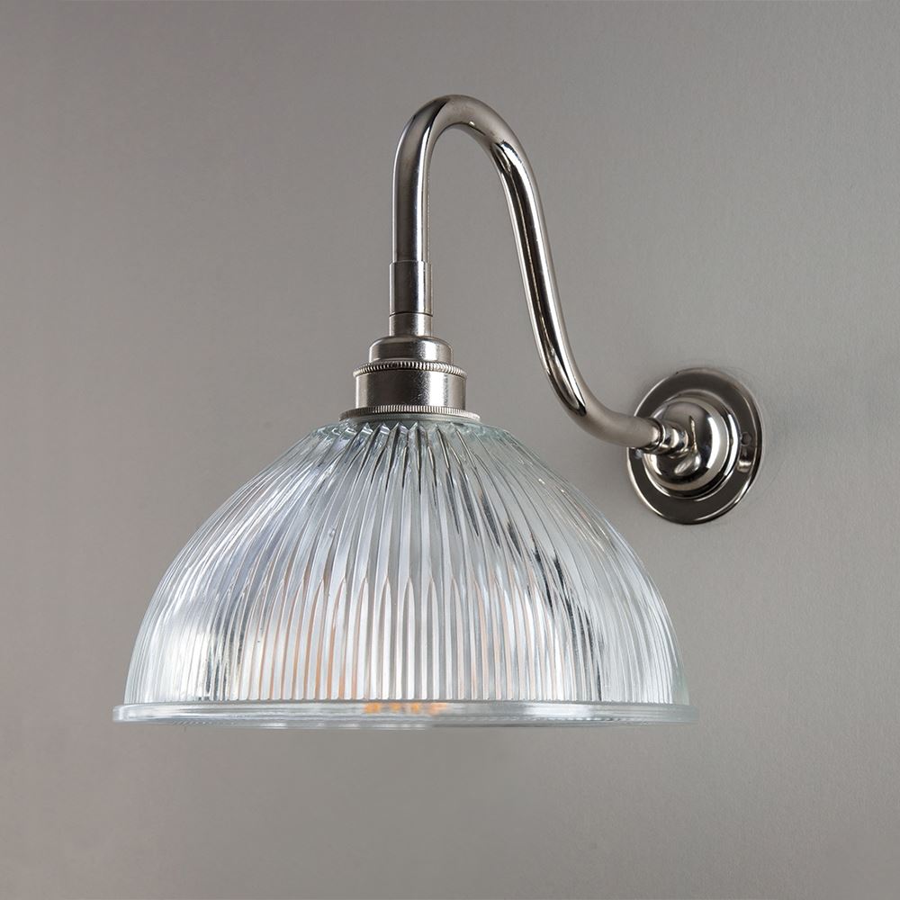 An Old School Electric Prismatic Dome Swan Arm Wall Light with a glass shade, perfect for lighting fixtures.