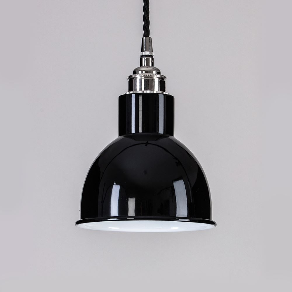 An Old School Electric Churchill Coloured Shades Pendant Light hanging on a white wall.