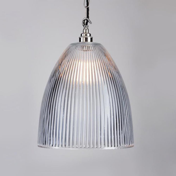 An elegant Elongated Prismatic Pendant Light by Old School Electric with a clear glass shade.