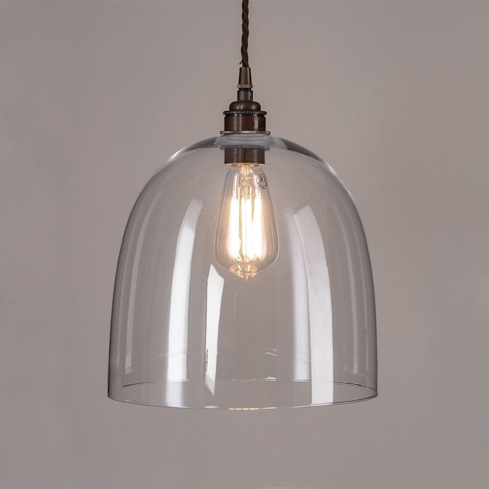 A stunning Bell Blown Glass Pendant Light fixture with a metal chain from Old School Electric.