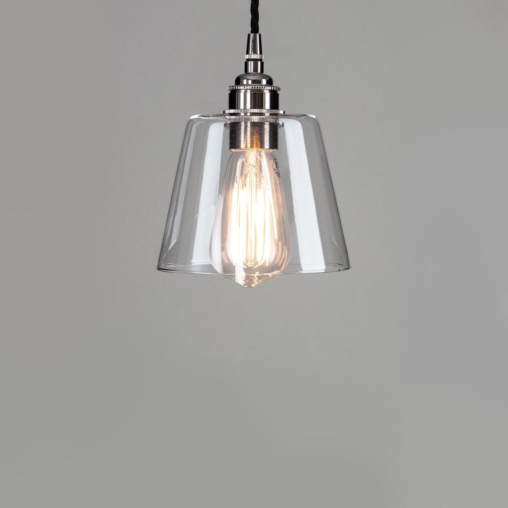 An Old School Electric Tapered Blown Glass Pendant Light fixture with a metal frame.