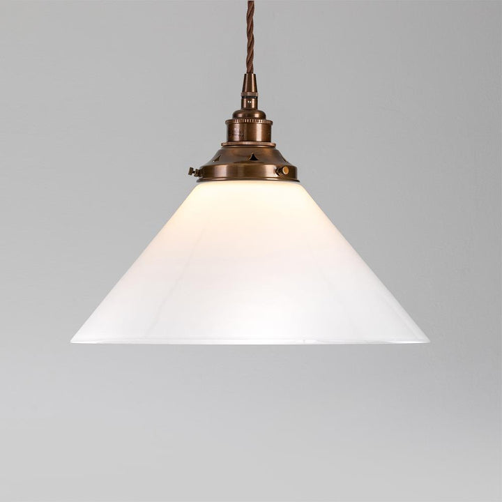 An Old School Electric Conical Opal Glass Pendant Light luminaire with a white glass shade.