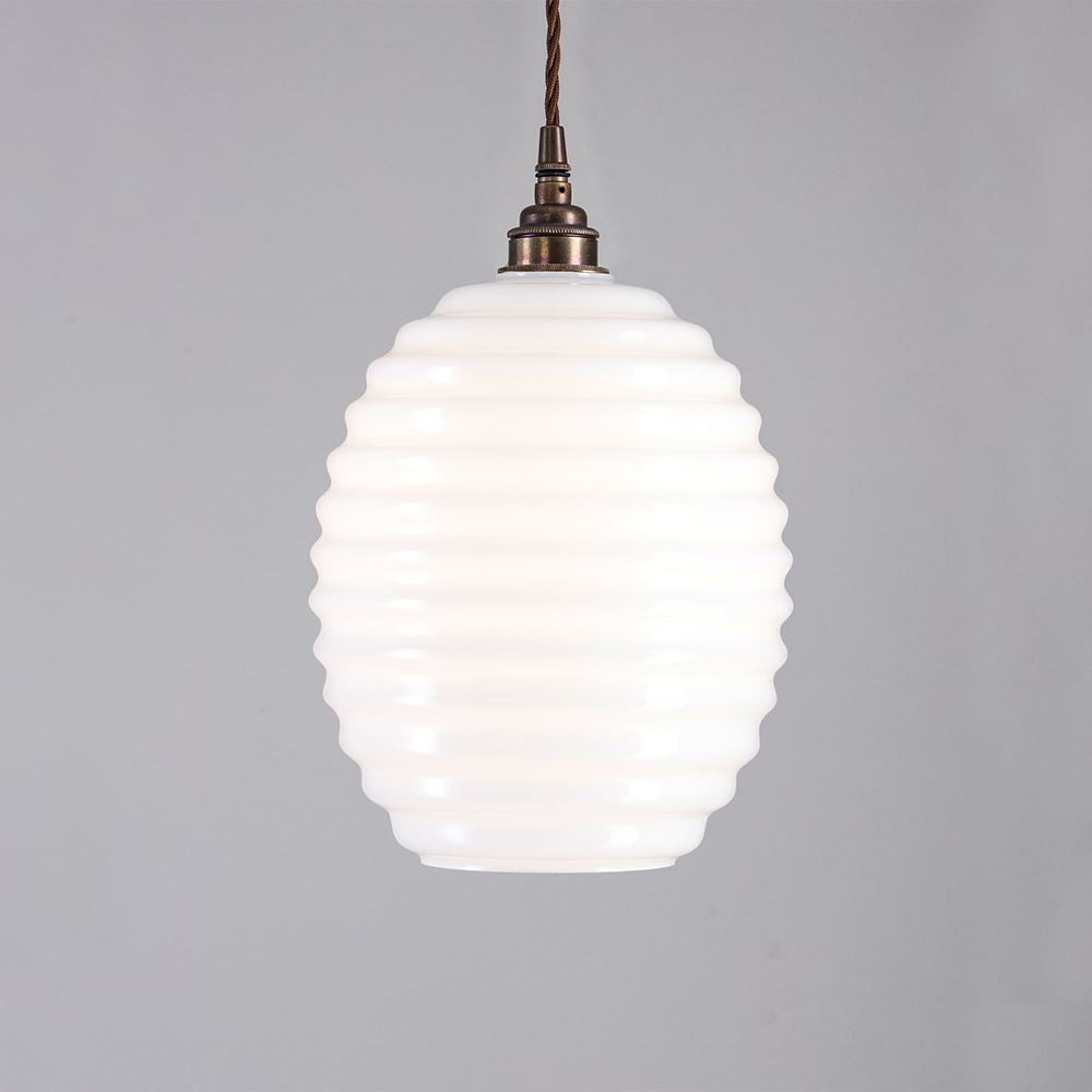 An Old School Electric Beehive Pendant Light with a white glass shade, perfect for your lighting fixtures needs.