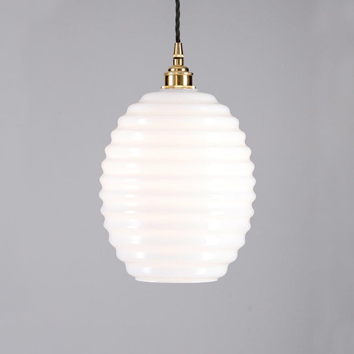 An Old School Electric Beehive Pendant Light fitting with a white glass shade.