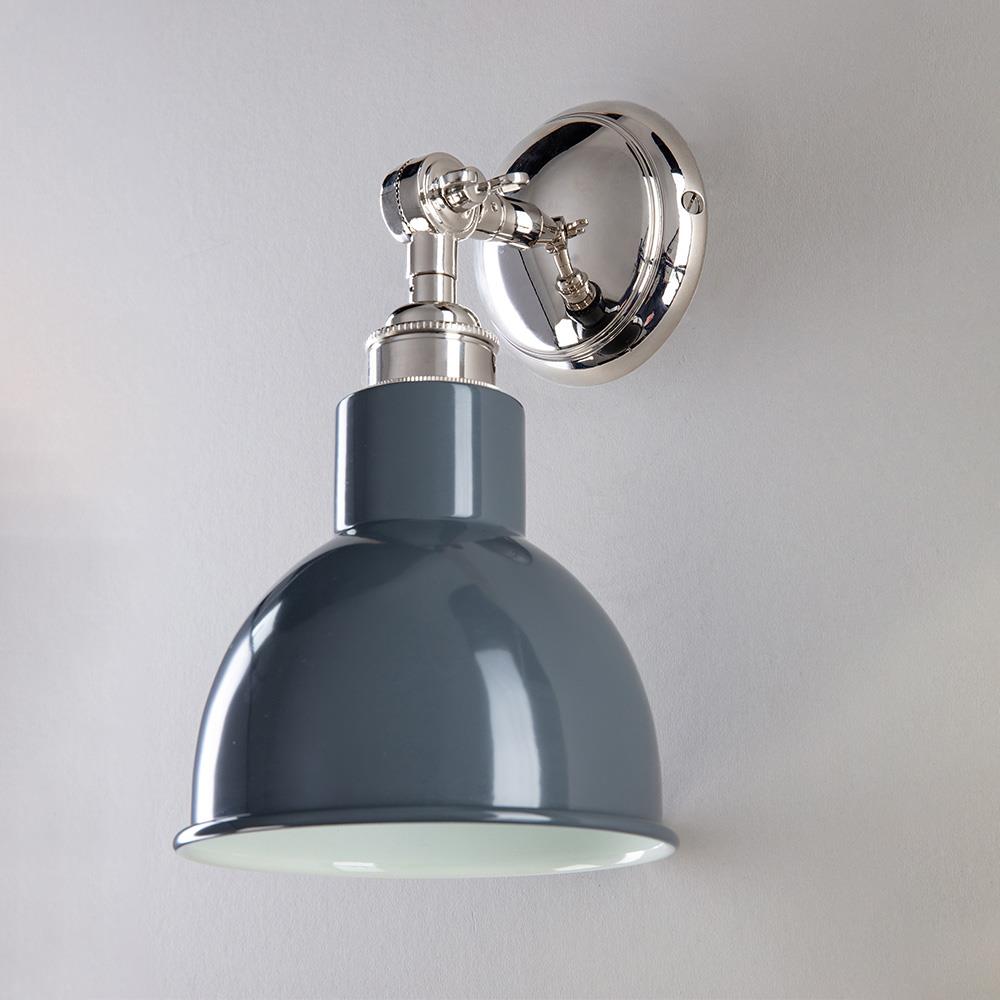 An Old School Electric Churchill Short Arm Wall Light with a grey shade on a white wall.