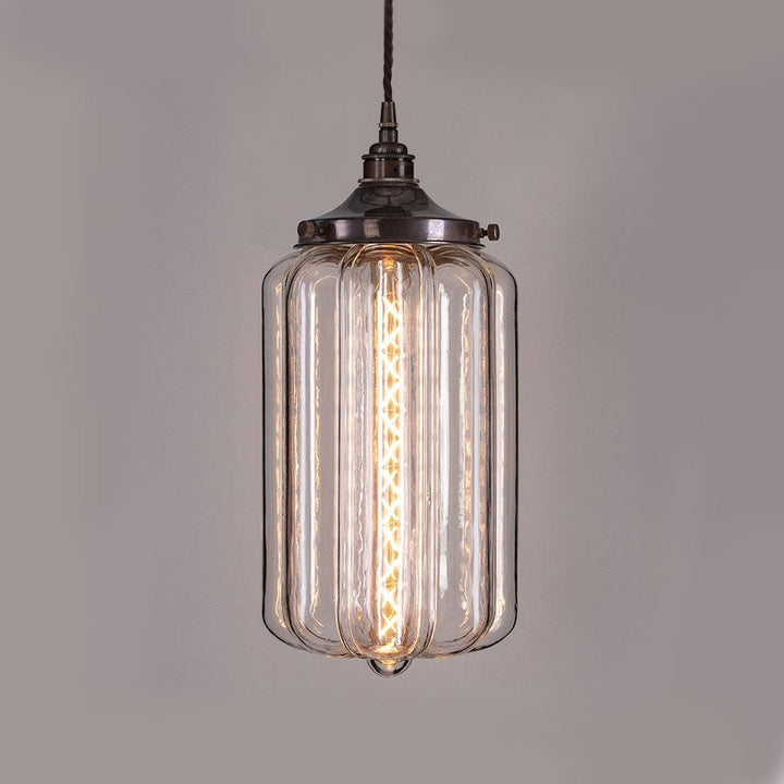 An Old School Electric Ellington pendant light with a metal frame, perfect for enhancing your home decor and providing an elegant lighting fixture.