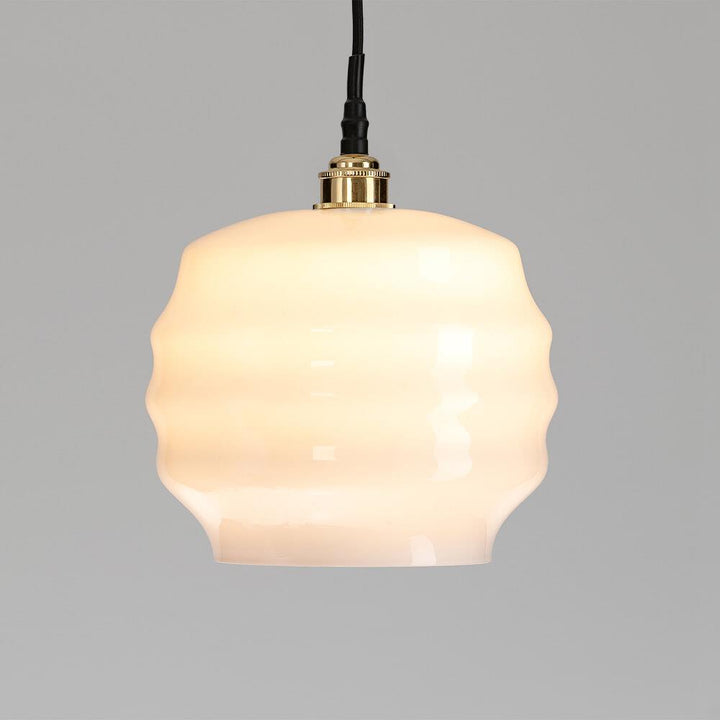 A Deco Bathroom Pendant Light with a white glass shade is an Old School Electric electric lighting fixture.