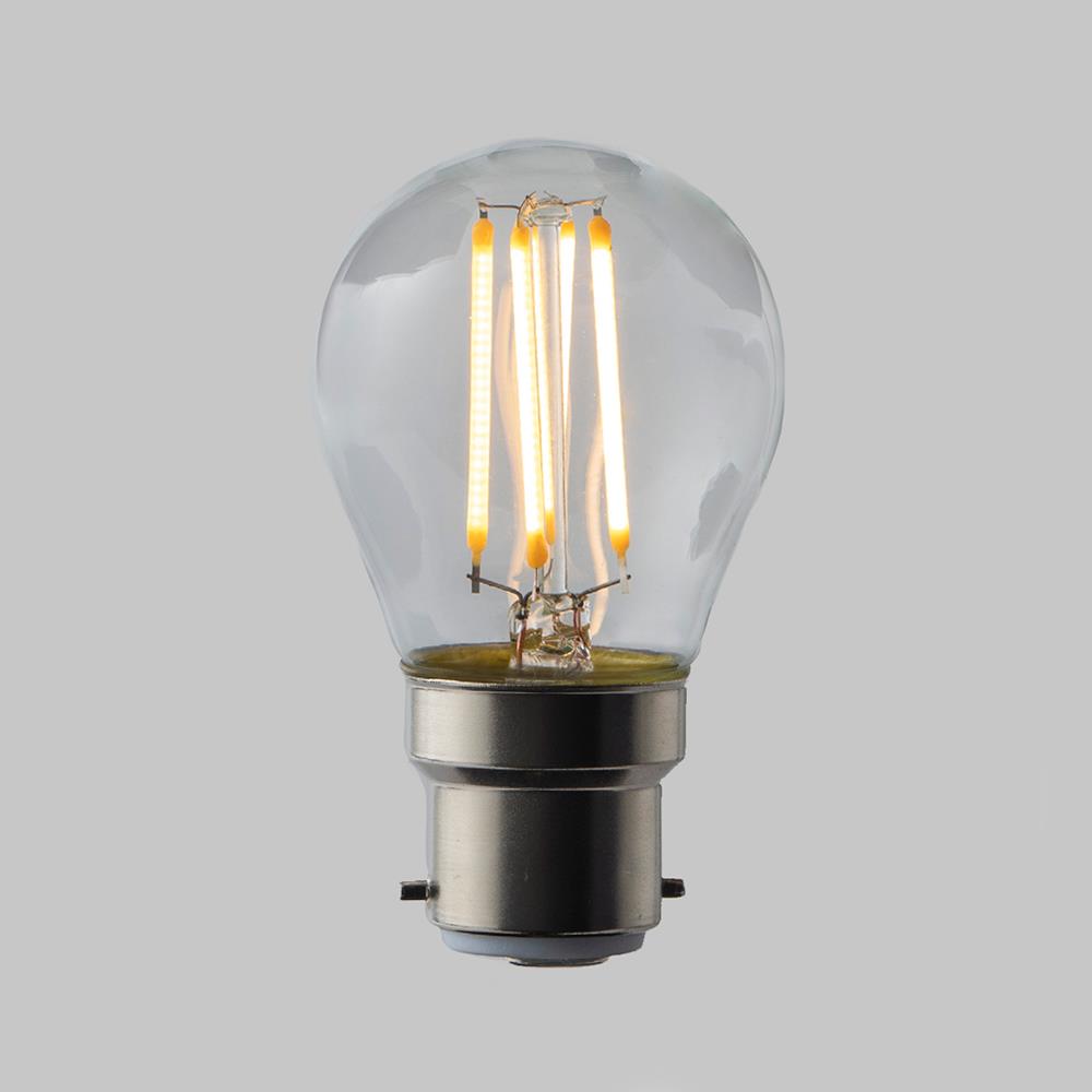 An image of an Old School Electric LED Filament Dimmable Golf Ball Bulb (B22) on a gray background.