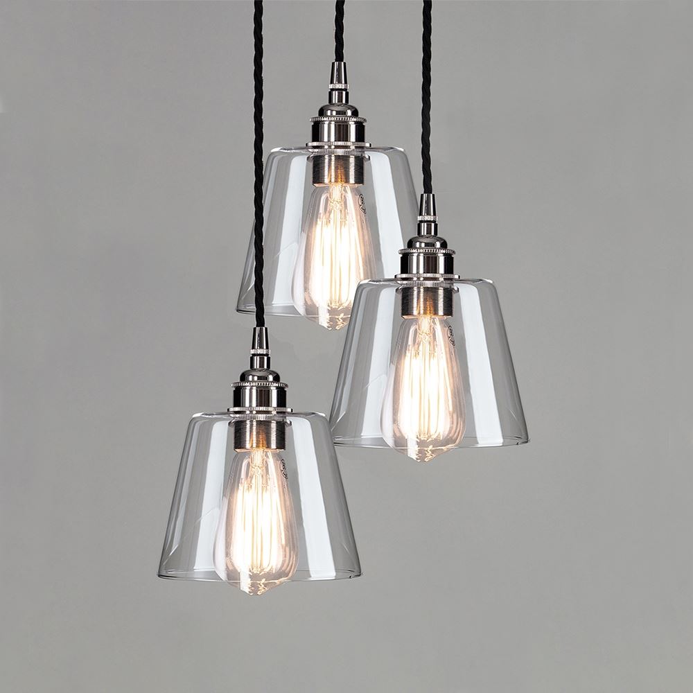 Three Old School Electric Blown Clear Glass Cluster Pendant Lights hanging from a metal chain, serving as stunning lighting fixtures.