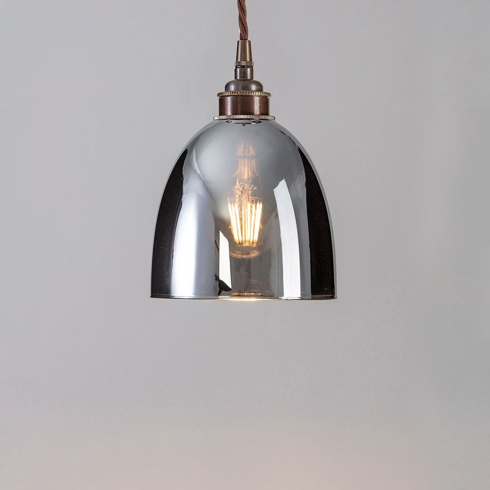 An Old School Electric Bell Blown Smoked Glass Pendant Light with a chrome finish and a brown cord, featuring a smoked glass shade.