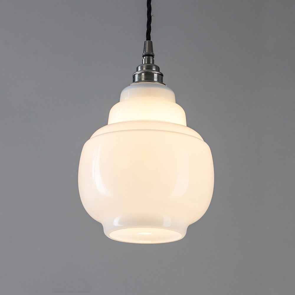 An Old School Electric pendant light with a Barrel Opal Glass shade, perfect for lighting fixtures.