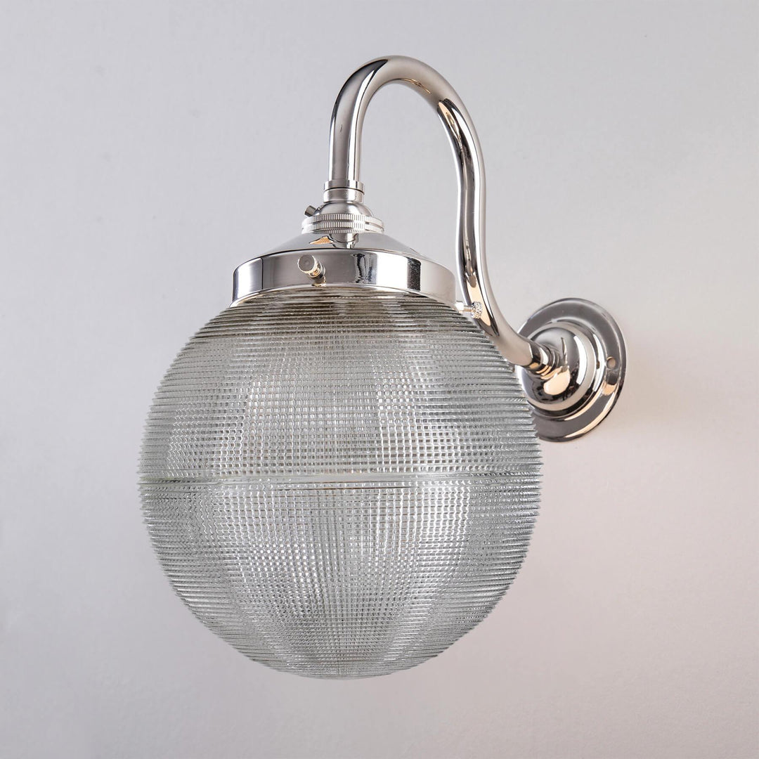 An Old School Electric Prismatic Globe Wall Light, ideal for lighting fixtures or as a light fitting.