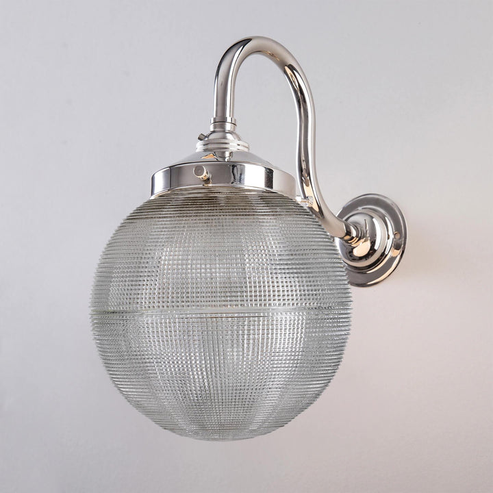 An Old School Electric Prismatic Globe Wall Light, ideal for lighting fixtures or as a light fitting.