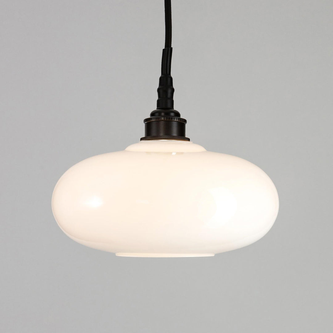 An Old School Electric Montgomery Bathroom Pendant Light fitting with a black cord.