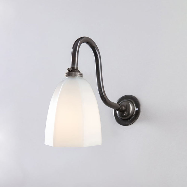 An Old School Electric lighting fixture with a Hexagon Swan Wall Light (B22) white glass shade.